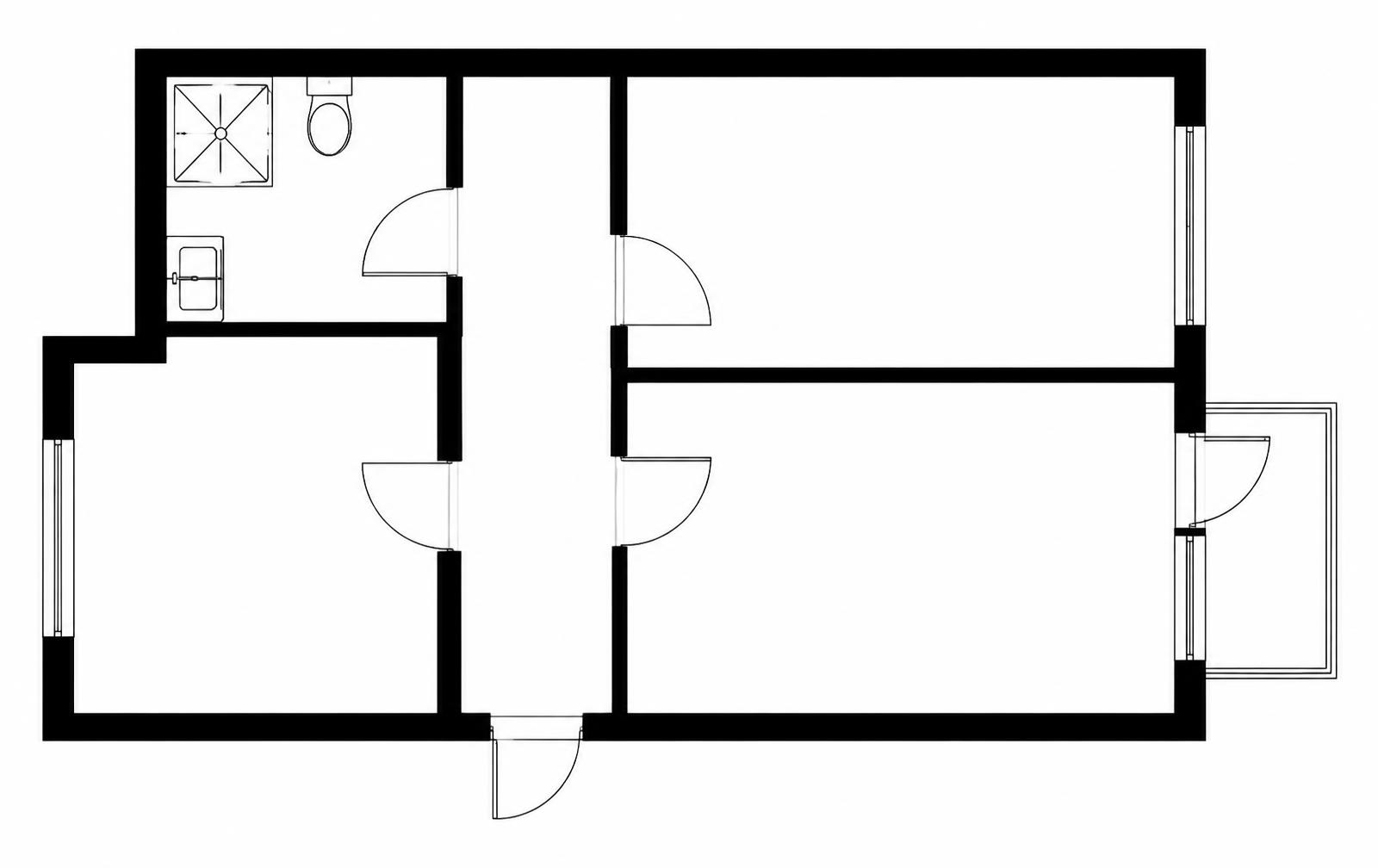 Svartvit planritning av en tvårumslägenhet